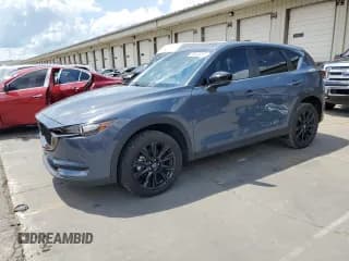 ✅ 2021 Mazda CX-5 Carbon Edition • VIN: JM3KFACY9M0382864 • Lot: 66646065. Listed on Copart with 40,622 mi. Free auction sales archive from the USA and detailed vehicle history report at DreamBid. Image 1.