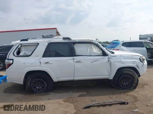 ✅ 2019 Toyota 4Runner SR5 • VIN: JTEZU5JR9K5201094 • Lot: 43519344. Listed on IAAI with 131,022 mi. Free auction sales archive from the USA and detailed vehicle history report at DreamBid. Image 13.