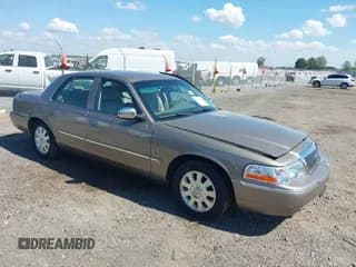 ✅ 2005 Mercury Grand Marquis LS Premium • VIN: 2MEFM75W85X666079 • Lot: 43339214. Wystawiony na IAAI z przebiegiem 66 473 mil. Bezpłatny archiwum sprzedaży aukcyjnych z USA i szczegółowy raport historii pojazdu na DreamBid. Zdjęcie 1.