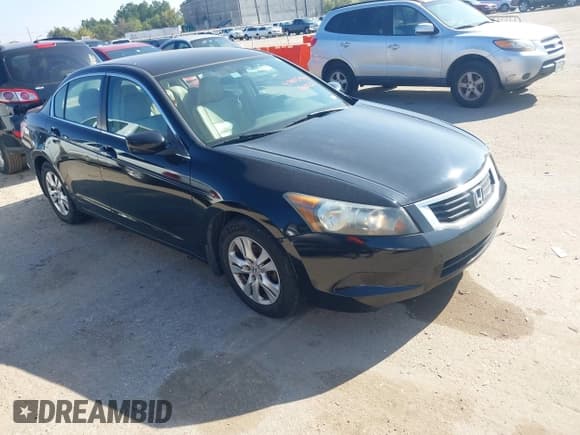✅ 2009 Honda Accord LX-P • VIN: 1HGCP26439A051046 • Lot: 43885943. Listed on IAAI with 203,128 mi. Free auction sales archive from the USA and detailed vehicle history report at DreamBid. Image 1.