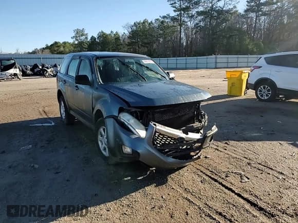 ✅ 2010 Mazda Tribute Sport • VIN: 4F2CY0C70AKM03819 • Lot: 46673815. Listed on Copart with Not provided. Free auction sales archive from the USA and detailed vehicle history report at DreamBid. Image 12.