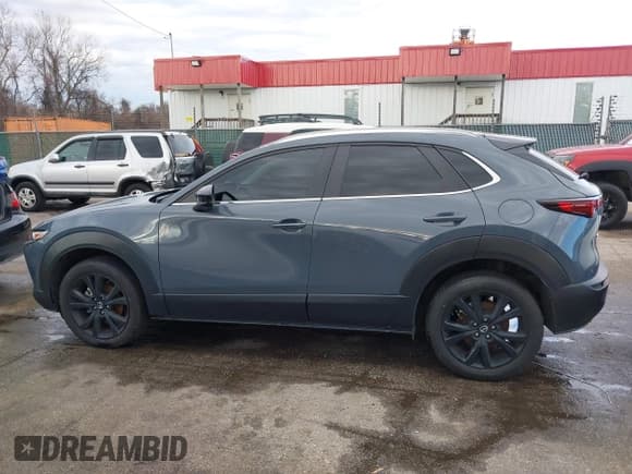 ✅ 2022 Mazda CX-30 S Carbon Edition • VIN: 3MVDMBCL0NM458115 • Lot: 41223224. Listed on IAAI with 67,066 mi. Free auction sales archive from the USA and detailed vehicle history report at DreamBid. Image 14.