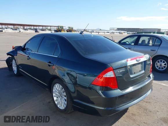 ✅ 2010 Ford Fusion Hybrid • VIN: 3FADP0L32AR270891 • Lot: 43210675. Wystawiony na IAAI z przebiegiem 277 208 mil. Bezpłatny archiwum sprzedaży aukcyjnych z USA i szczegółowy raport historii pojazdu na DreamBid. Zdjęcie 3.