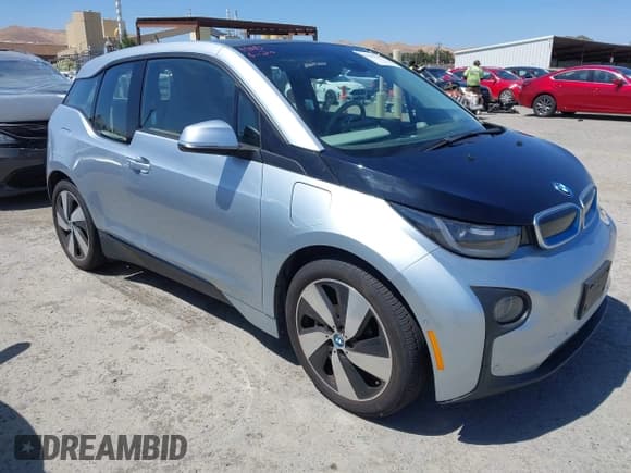 ✅ 2014 BMW i3 • VIN: WBY1Z4C54EVX62877 • Lot: 42543587. Listed on IAAI with 68,214 mi. Free auction sales archive from the USA and detailed vehicle history report at DreamBid. Image 1.