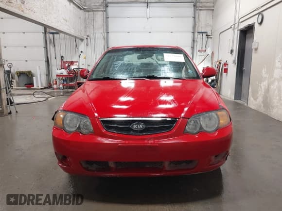 ✅ 2003 Kia Spectra GS • VIN: KNAFB161035115874 • Lot: 42179809. Wystawiony na IAAI z przebiegiem 127 594 mil. Bezpłatny archiwum sprzedaży aukcyjnych z USA i szczegółowy raport historii pojazdu na DreamBid. Zdjęcie 12.