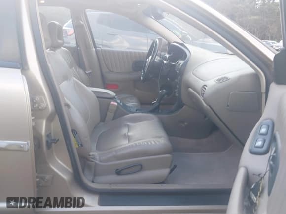 ✅ 2003 Pontiac Grand Prix GT • VIN: 1G2WP52K73F136035 • Lot: 43384195. Wystawiony na IAAI z przebiegiem 104 958 mil. Bezpłatny archiwum sprzedaży aukcyjnych z USA i szczegółowy raport historii pojazdu na DreamBid. Zdjęcie 5.