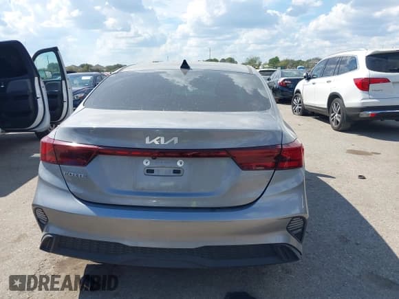 ✅ 2023 Kia Forte LXS • VIN: 3KPF24AD2PE606561 • Lot: 43400482. Listed on IAAI with 61,935 mi. Free auction sales archive from the USA and detailed vehicle history report at DreamBid. Image 17.