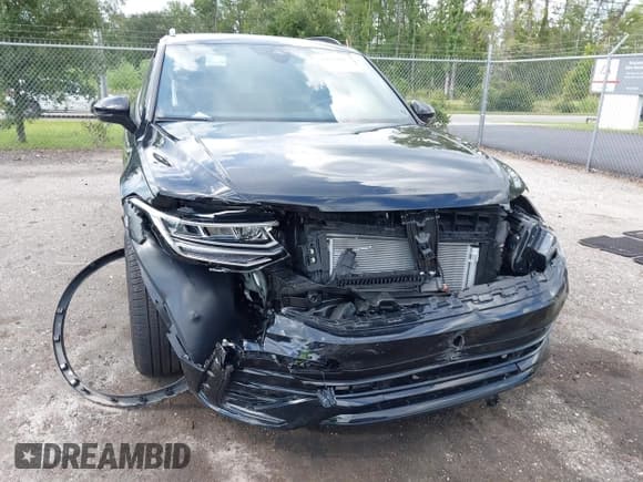 ✅ 2024 Volkswagen Tiguan SE R-Line Black • VIN: 3VVCB7AX9RM199007 • Lot: 42670002. Listed on IAAI with 11,298 mi. Free auction sales archive from the USA and detailed vehicle history report at DreamBid. Image 6.