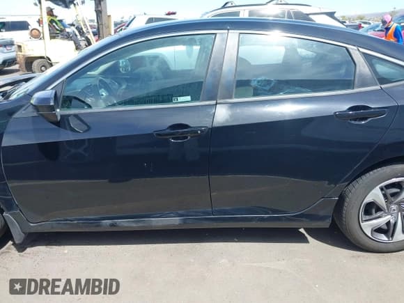 ✅ 2020 Honda Civic LX • VIN: 19XFC2F63LE210936 • Lot: 42163809. Listed on IAAI with 89,955 mi. Free auction sales archive from the USA and detailed vehicle history report at DreamBid. Image 14.