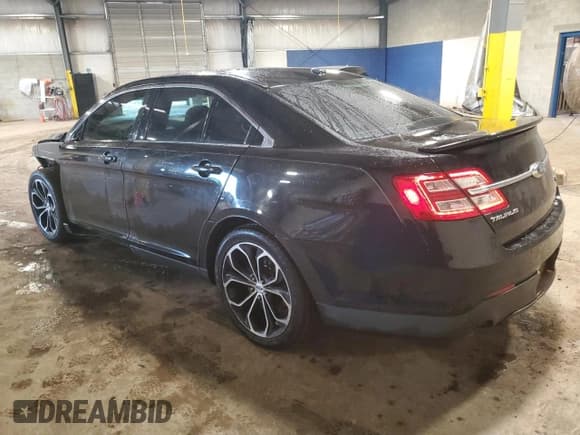 ✅ 2015 Ford Taurus SHO • VIN: 1FAHP2KT8FG153345 • Lot: 61566365. Listed on Copart with 174,909 mi. Free auction sales archive from the USA and detailed vehicle history report at DreamBid. Image 2.