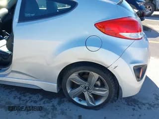 ✅ 2013 Hyundai Veloster Turbo • VIN: KMHTC6AE8DU180081 • Lot: 41736188. Wystawiony na IAAI z przebiegiem 86 076 mil. Bezpłatny archiwum sprzedaży aukcyjnych z USA i szczegółowy raport historii pojazdu na DreamBid. Zdjęcie 6.