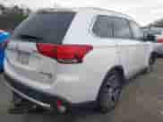 2018 Mitsubishi Outlander SE with VIN JA4AD3A31JZ068236, listed as a IAAI auction lot 40917348 with 144,529 mi miles and . Bid and sale history available at DreamBid. Image 4.