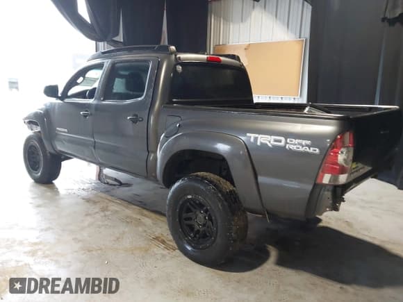 ✅ 2015 Toyota Tacoma • VIN: 3TMLU4EN9FM164933 • Lot: 41447209. Listed on IAAI with 248,613 mi. Free auction sales archive from the USA and detailed vehicle history report at DreamBid. Image 3.