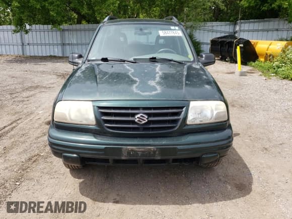 ✅ 2003 Suzuki Vitara JLX • VIN: 2S3TD52V136101732 • Лот: 58477845. Опубликован ранее на Copart с пробегом 105 628 миль. Бесплатный доступ к архиву аукционных продаж из США и подробный отчёт об истории автомобиля на DreamBid. Изображение 5.
