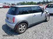 ✅ 2006 MINI Hardtop • VIN: WMWRC33516TK16354 • Lot: 42565359. Listed on IAAI with 111,800 mi. Free auction sales archive from the USA and detailed vehicle history report at DreamBid. Image 4.