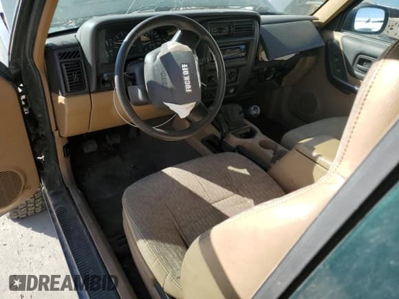 ✅ 1999 Jeep Cherokee Sport • VIN: 1J4FF67S9XL655246 • Лот: 71818795. Опубликован ранее на Copart с пробегом 182 228 миль. Бесплатный доступ к архиву аукционных продаж из США и подробный отчёт об истории автомобиля на DreamBid. Изображение 8.