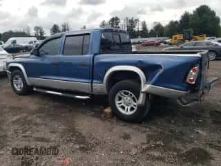2003 Dodge Dakota SLT z VIN 1D7HL48X93S367092, wystawiony jako Copart lot #71961274 z przebiegiem 160 709 mil mil oraz Szkoda całkowita • Salvage title. Historia ofert i sprzedaży dostępna na DreamBid. Obrazek 2.