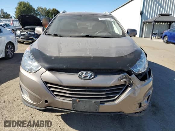 2013 Hyundai Tucson GLS z VIN KM8JU3AC6DU707956, wystawiony jako Copart lot #85569025 z przebiegiem 180 893 mil mil oraz Czysty tytuł • Clean title. Historia ofert i sprzedaży dostępna na DreamBid. Obrazek 5.