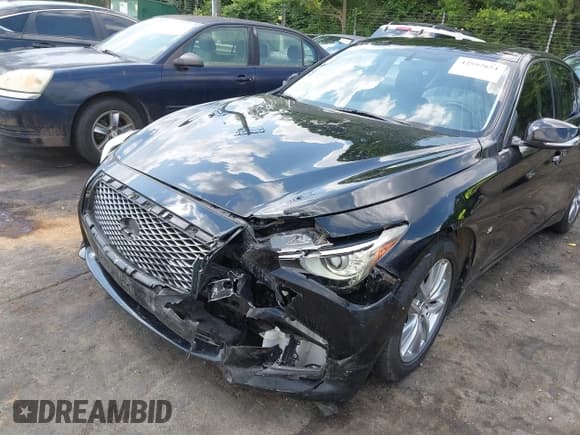 ✅ 2014 Infiniti Q50 Premium • VIN: JN1BV7AR5EM694736 • Лот: 42597654. Опубликован ранее на IAAI с пробегом 82 963 миль. Бесплатный доступ к архиву аукционных продаж из США и подробный отчёт об истории автомобиля на DreamBid. Изображение 6.
