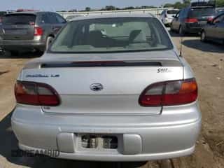 2001 Chevrolet Malibu LS z VIN 1G1NE52J016234947, wystawiony jako Copart lot #75533264 z przebiegiem 138 349 mil mil oraz Szkoda całkowita • Salvage title. Historia ofert i sprzedaży dostępna na DreamBid. Obrazek 6.