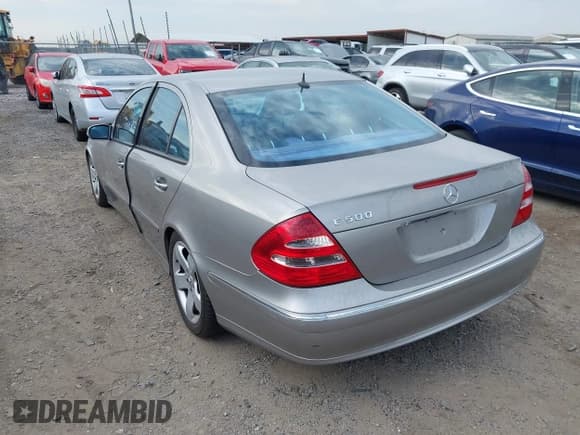 ✅ 2005 Mercedes-Benz E 500 • VIN: WDBUF70J05A650027 • Lot: 43015577. Listed on IAAI with 107,306 mi. Free auction sales archive from the USA and detailed vehicle history report at DreamBid. Image 3.