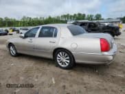 ✅ 2003 Lincoln Town Car Signature • VIN: 1LNHM82W43Y636008 • Lot: 64011125. Listed on Copart with 229,221 mi. Free auction sales archive from the USA and detailed vehicle history report at DreamBid. Image 2.