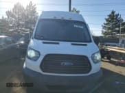 ✅ 2016 Ford Transit Cargo • VIN: 1FTBF4XG7GKA26157 • Лот: 84770754. Опубликован ранее на Copart с пробегом 137 282 миль. Бесплатный доступ к архиву аукционных продаж из США и подробный отчёт об истории автомобиля на DreamBid. Изображение 5.