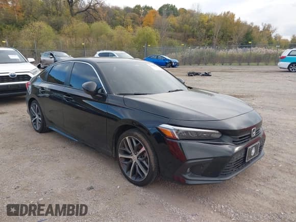 ✅ 2023 Honda Civic Touring • VIN: 2HGFE1F91PH311709 • Lot: 43571029. Wystawiony na IAAI z przebiegiem 31 900 mil. Bezpłatny archiwum sprzedaży aukcyjnych z USA i szczegółowy raport historii pojazdu na DreamBid. Zdjęcie 1.