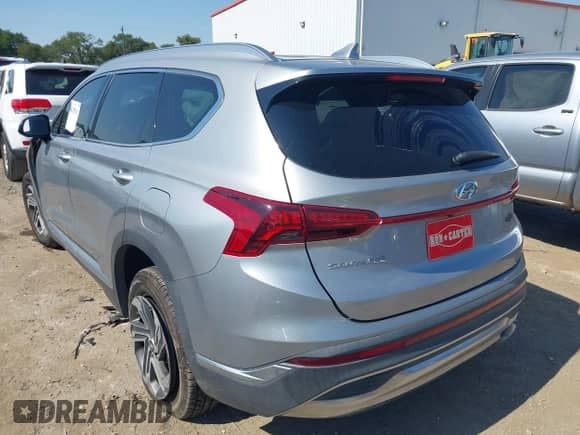 2021 Hyundai Santa Fe SEL z VIN 5NMS24AJ7MH307785, wystawiony jako IAAI lot #43155163 z przebiegiem 69 928 mil mil oraz . Historia ofert i sprzedaży dostępna na DreamBid. Obrazek 3.