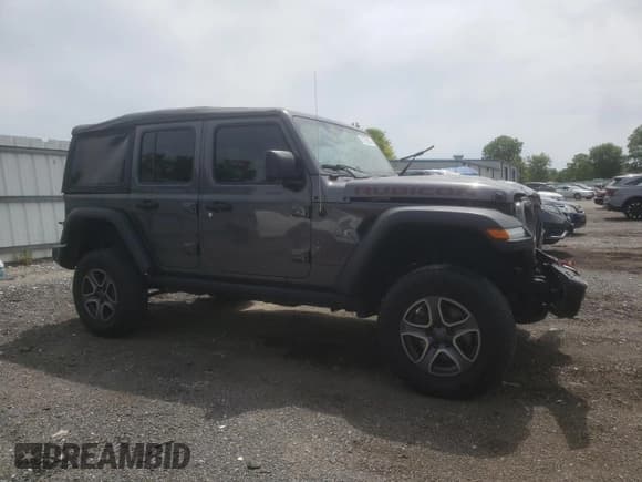 ✅ 2023 Jeep Wrangler Rubicon • VIN: 1C4HJXFG0PW523040 • Lot: 57705055. Listed on Copart with 23,405 mi. Free auction sales archive from the USA and detailed vehicle history report at DreamBid. Image 4.