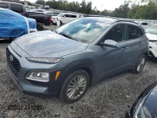 ✅ 2021 Hyundai Kona SEL • VIN: KM8K22AA2MU630215 • Лот: 85161555. Опубликован ранее на Copart с пробегом 38 927 миль. Бесплатный доступ к архиву аукционных продаж из США и подробный отчёт об истории автомобиля на DreamBid. Изображение 1.
