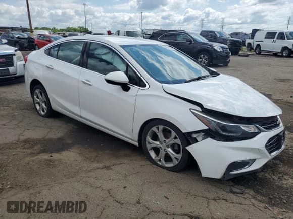 ✅ 2017 Chevrolet Cruze Premier • VIN: 1G1BF5SM3H7237257 • Lot: 60329633. Listed on Copart with 106,037 mi. Free auction sales archive from the USA and detailed vehicle history report at DreamBid. Image 4.