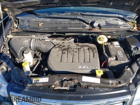 ✅ 2014 Chrysler Town & Country • VIN: 2C7WC1BG2ER221634 • Lot: 43385196. Listed on IAAI with 38,299 mi. Free auction sales archive from the USA and detailed vehicle history report at DreamBid. Image 10.