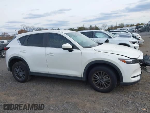 ✅ 2021 Mazda CX-5 Touring • VIN: JM3KFBCM8M0417025 • Lot: 43521796. Wystawiony na IAAI z przebiegiem 44 218 mil. Bezpłatny archiwum sprzedaży aukcyjnych z USA i szczegółowy raport historii pojazdu na DreamBid. Zdjęcie 14.