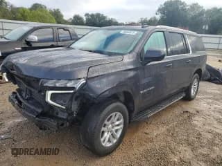 ✅ 2023 Chevrolet Suburban LT • VIN: 1GNSCCKD9PR289877 • Lot: 89849575. Listed on Copart with 74,284 mi. Free auction sales archive from the USA and detailed vehicle history report at DreamBid. Image 1.