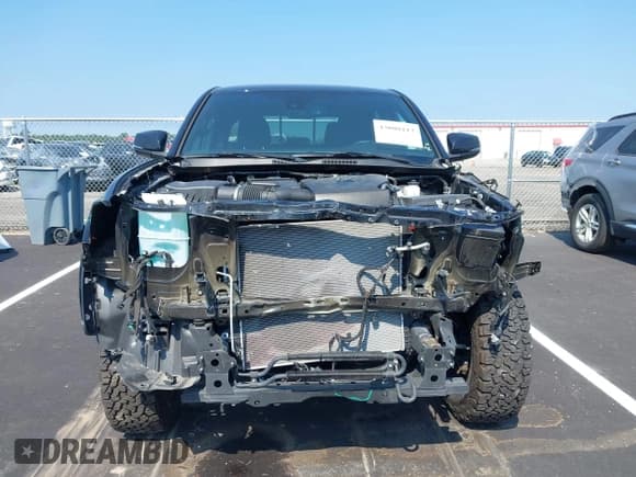 ✅ 2020 Toyota Tacoma SR5 • VIN: 5TFCZ5AN2LX235148 • Lot: 43008112. Listed on IAAI with 25,645 mi. Free auction sales archive from the USA and detailed vehicle history report at DreamBid. Image 13.