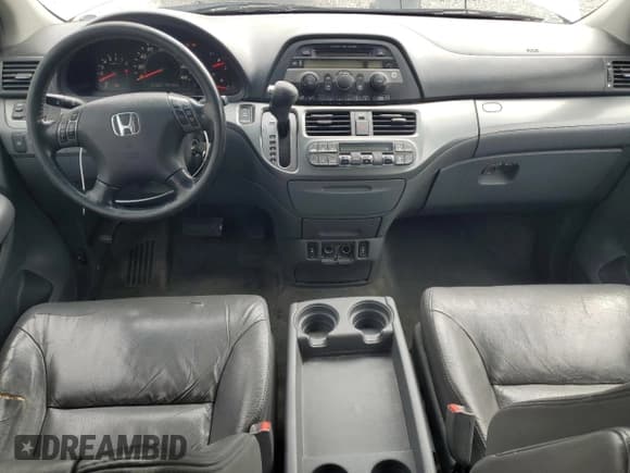 ✅ 2006 Honda Odyssey EX-L • VIN: 5FNRL38656B410666 • Лот: 80554015. Опубликован ранее на Copart с пробегом 243 001 миль. Бесплатный доступ к архиву аукционных продаж из США и подробный отчёт об истории автомобиля на DreamBid. Изображение 8.