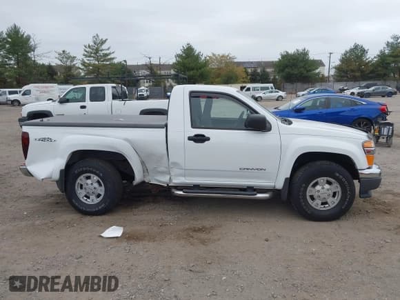 ✅ 2005 GMC Canyon SLE Z71 • VIN: 1GTDS146658161977 • Lot: 43563928. Listed on IAAI with 95,521 mi. Free auction sales archive from the USA and detailed vehicle history report at DreamBid. Image 13.