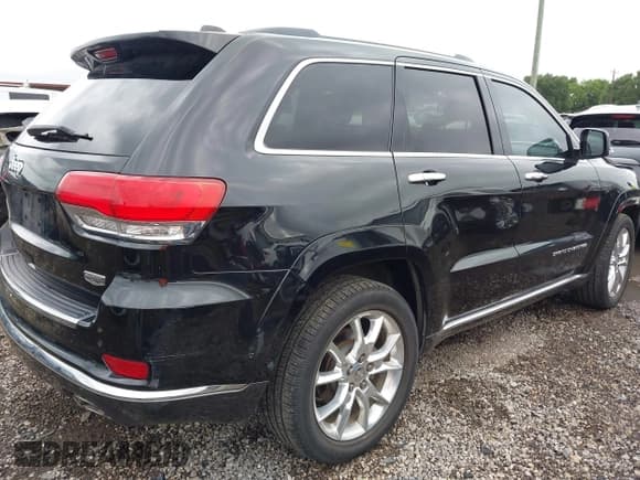 ✅ 2015 Jeep Grand Cherokee Summit • VIN: 1C4RJEJG9FC131724 • Lot: 42491343. Listed on IAAI with 131,196 mi. Free auction sales archive from the USA and detailed vehicle history report at DreamBid. Image 4.