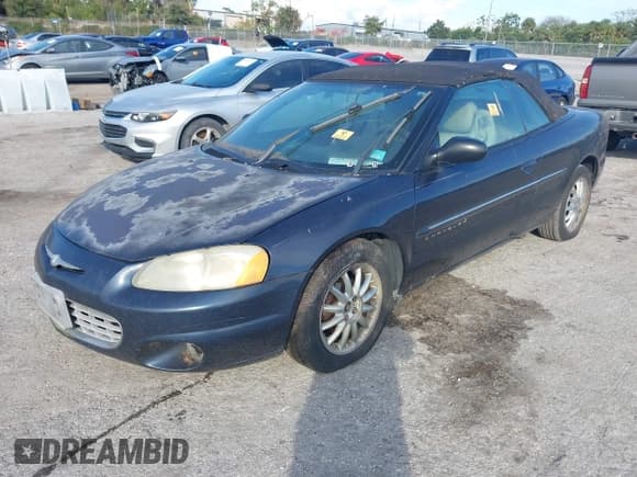 ✅ 2001 Chrysler Sebring Limited • VIN: 1C3EL65U01N655408 • Lot: 43794645. Wystawiony na IAAI z przebiegiem Nie podano. Bezpłatny archiwum sprzedaży aukcyjnych z USA i szczegółowy raport historii pojazdu na DreamBid. Zdjęcie 2.
