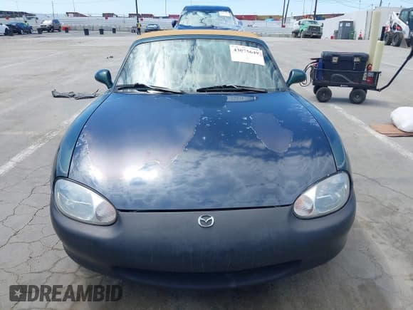 ✅ 1999 Mazda MX-5 Miata • VIN: JM1NB3534X0112735 • Lot: 43075649. Wystawiony na IAAI z przebiegiem 123 327 mil. Bezpłatny archiwum sprzedaży aukcyjnych z USA i szczegółowy raport historii pojazdu na DreamBid. Zdjęcie 12.