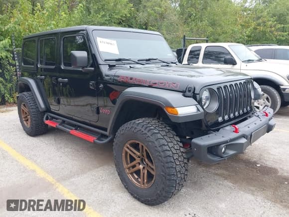 ✅ 2018 Jeep Wrangler Unlimited Rubicon • VIN: 1C4HJXFG1JW266235 • Lot: 43130963. Listed on IAAI with 82,309 mi. Free auction sales archive from the USA and detailed vehicle history report at DreamBid. Image 1.