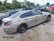 ✅ 2014 BMW M6 • VIN: WBS6C9C50EDV73695 • Lot: 43483000. Listed on IAAI with Not provided. Free auction sales archive from the USA and detailed vehicle history report at DreamBid. Image 4.