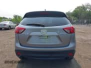 ✅ 2015 Mazda CX-5 Grand Touring • VIN: JM3KE4DY1F0530950 • Лот: 42425362. Опубликован ранее на IAAI с пробегом 120 088 миль. Бесплатный доступ к архиву аукционных продаж из США и подробный отчёт об истории автомобиля на DreamBid. Изображение 16.