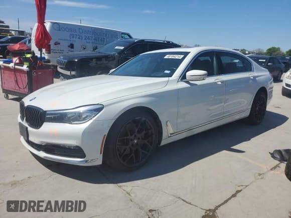 ✅ 2018 BMW 7 Series 740i xDrive • VIN: WBA7E4C52JGV24125 • Lot: 48164214. Listed on Copart with 77,695 mi. Free auction sales archive from the USA and detailed vehicle history report at DreamBid. Image 1.