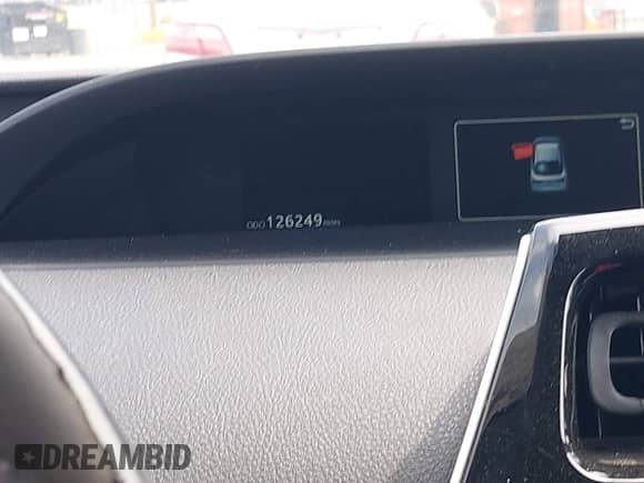 2021 Toyota Prius L Eco with VIN JTDKAMFU6M3127489, listed as a IAAI auction lot 42046658 with 126,249 mi miles and . Bid and sale history available at DreamBid. Image 7.