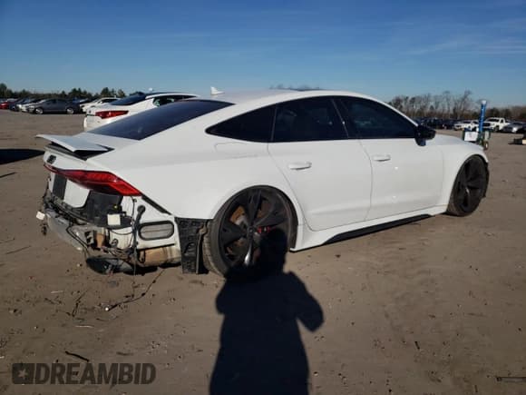 ✅ 2021 Audi RS 7 • VIN: WUAPCBF2XMN904458 • Lot: 80066123. Listed on Copart with 34,772 mi. Free auction sales archive from the USA and detailed vehicle history report at DreamBid. Image 3.