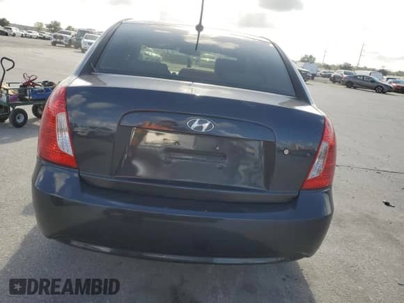 2011 Hyundai Accent GLS z VIN KMHCN4AC8BU612839, wystawiony jako Copart lot #79243824 z przebiegiem 119 663 mil mil oraz Szkoda całkowita • Salvage title. Historia ofert i sprzedaży dostępna na DreamBid. Obrazek 6.