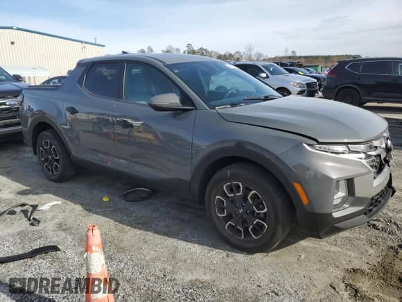 2022 Hyundai Santa Cruz SEL с VIN 5NTJB4AE2NH009763, выставлен на аукционе Copart как лот 84999934 с пробегом 53 601 миль миль и Списание • Salvage title. История ставок и продаж доступна на DreamBid. Изображение 4.