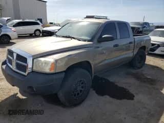 2006 Dodge Dakota SLT с VIN 1D7HE48KX6S573508, выставлен на аукционе Copart как лот 50822675 с пробегом 192 965 миль миль и Списание • Salvage title. История ставок и продаж доступна на DreamBid. Изображение 1.